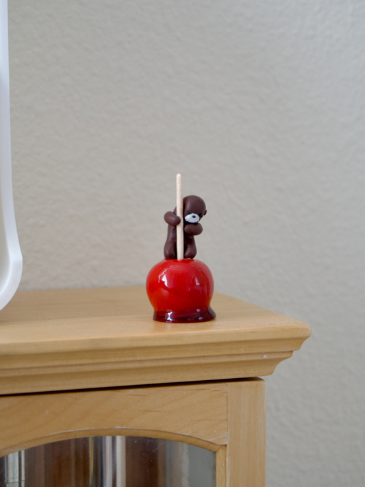 Koko the Otter Candied Apple Figurine